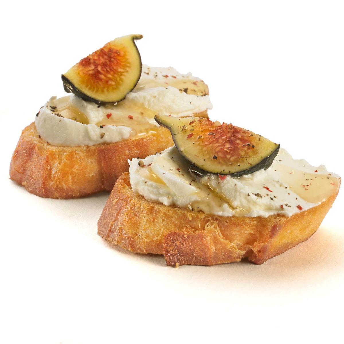 CUISIPRO Frischkäse-Set with white cheese varieties, displayed in small containers on a wooden surface.