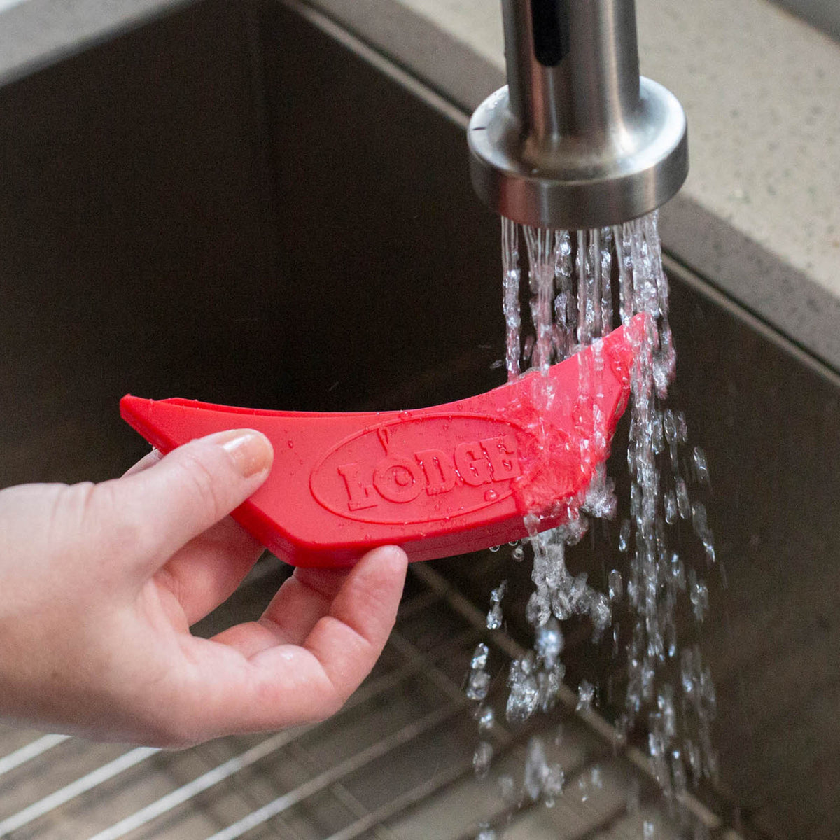 Black Lodge grip protection guard, durable and slip-resistant, designed to fit securely on kitchen or appliance handles.
