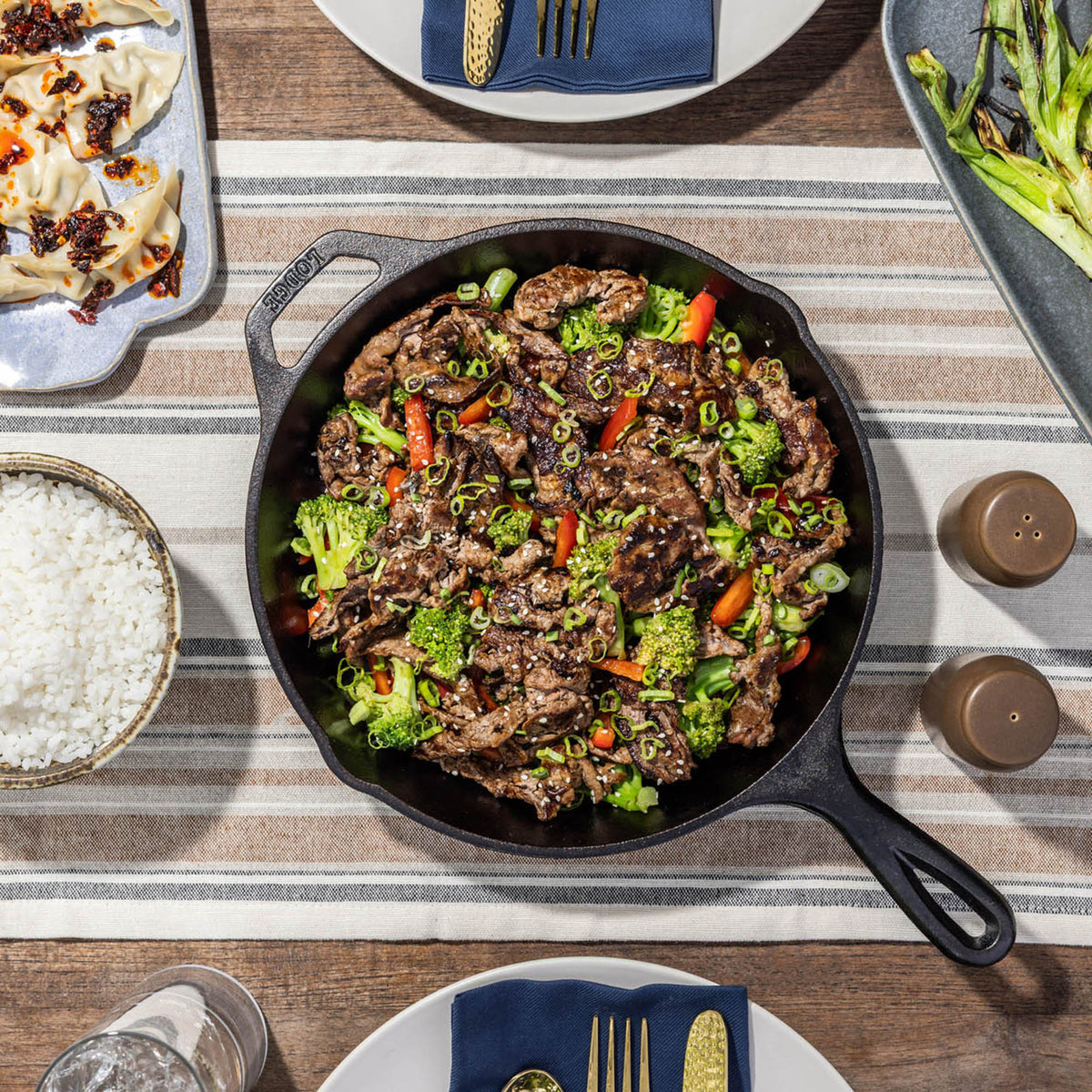 Lodge Classic cast iron skillet in black, showcasing its sturdy black cast iron surface and cooking surface.