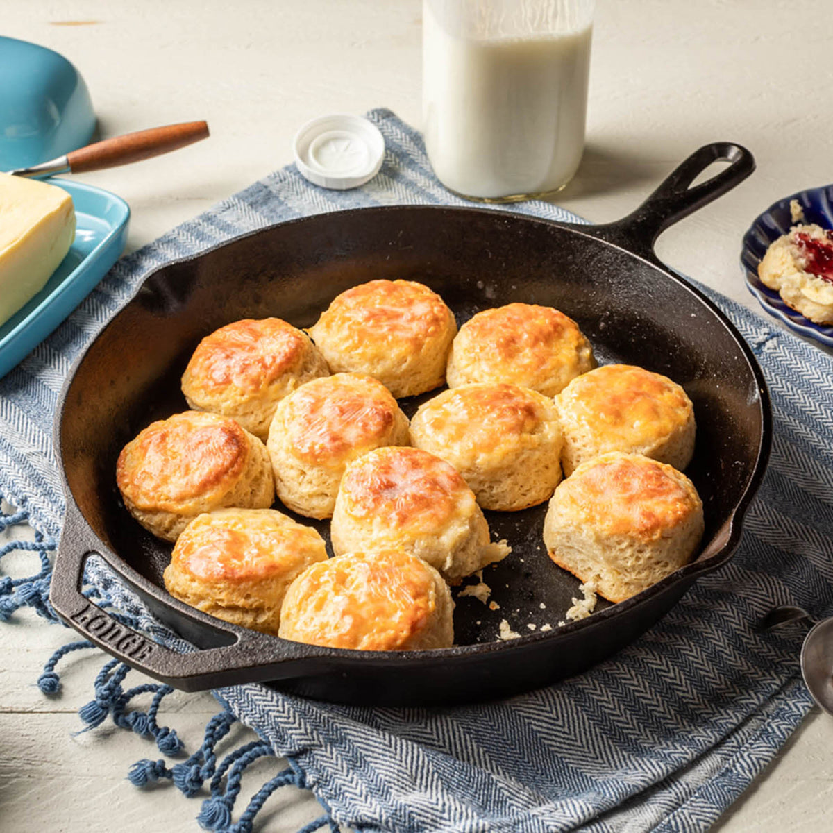 Lodge Classic cast iron skillet in black, showing a close-up of the seasoned cooking surface and sturdy handle.