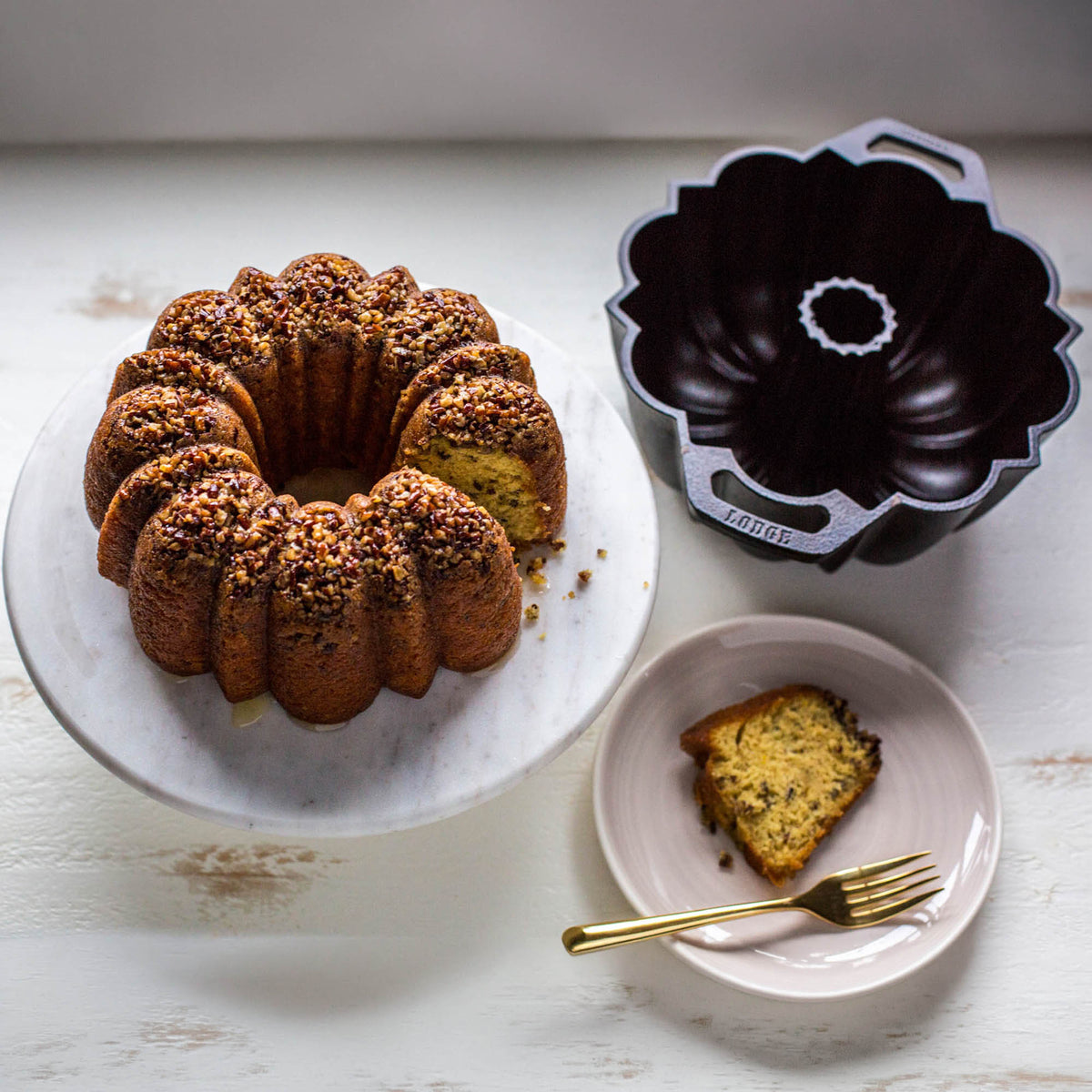 Lodge classic black cake pan with a sturdy round design, ideal for baking cakes and desserts.