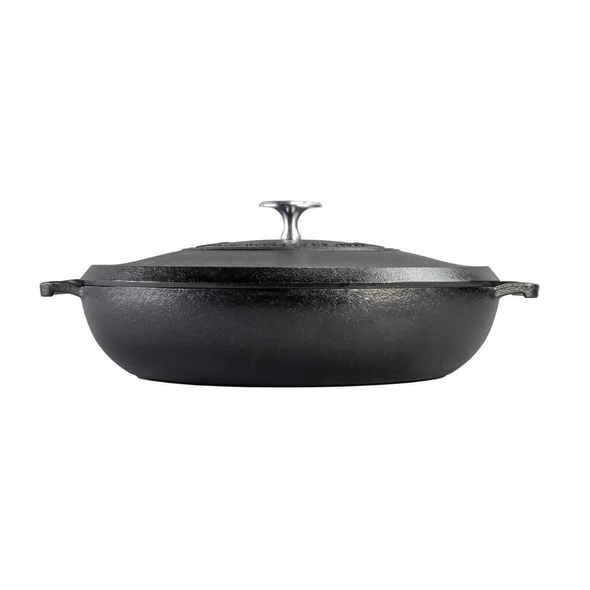 Lodge black cast iron Dutch oven bräter with a 3.8-liter capacity, featuring a sturdy lid and black finish.