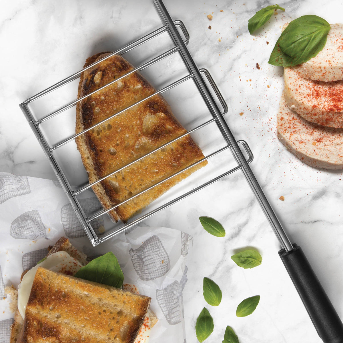 Dualit Classic stainless steel sandwich maker with non-stick plates, ready for making toasted sandwiches.