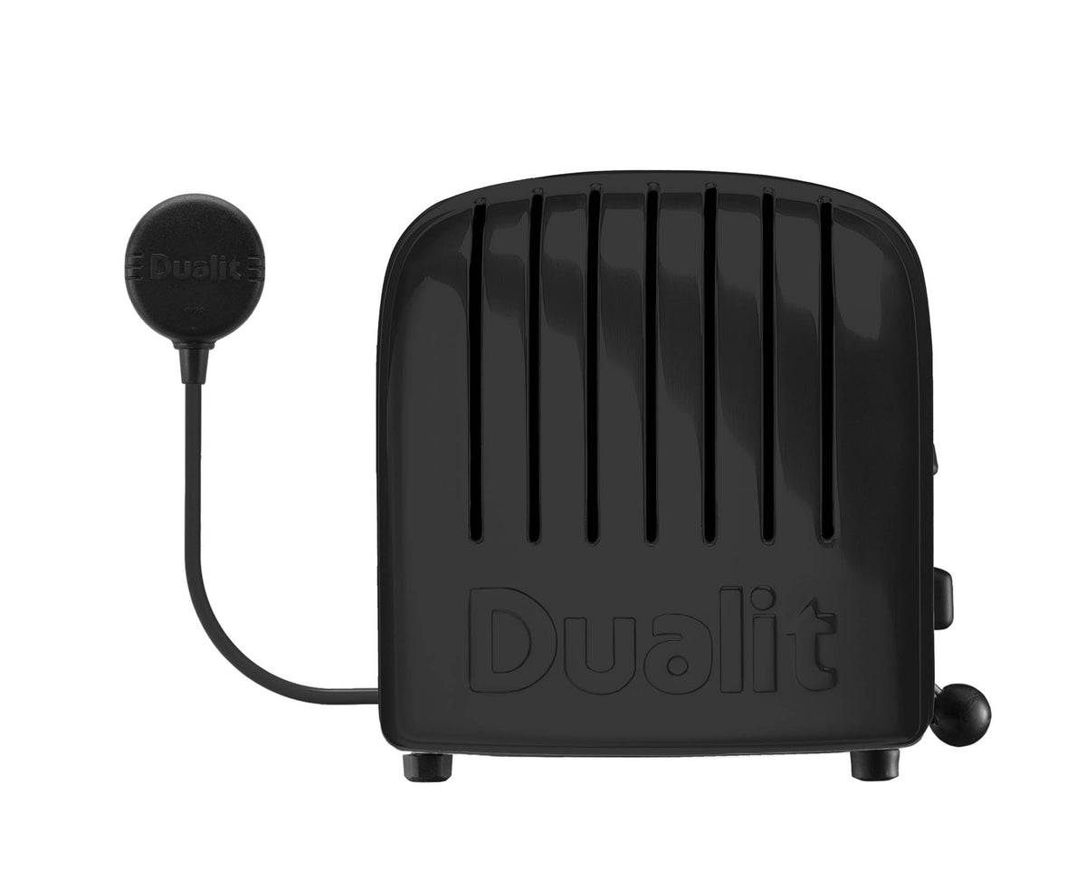 Dualit Newgen black 2-slice toaster with modern design and control knobs, ready for toasting bread slices.
