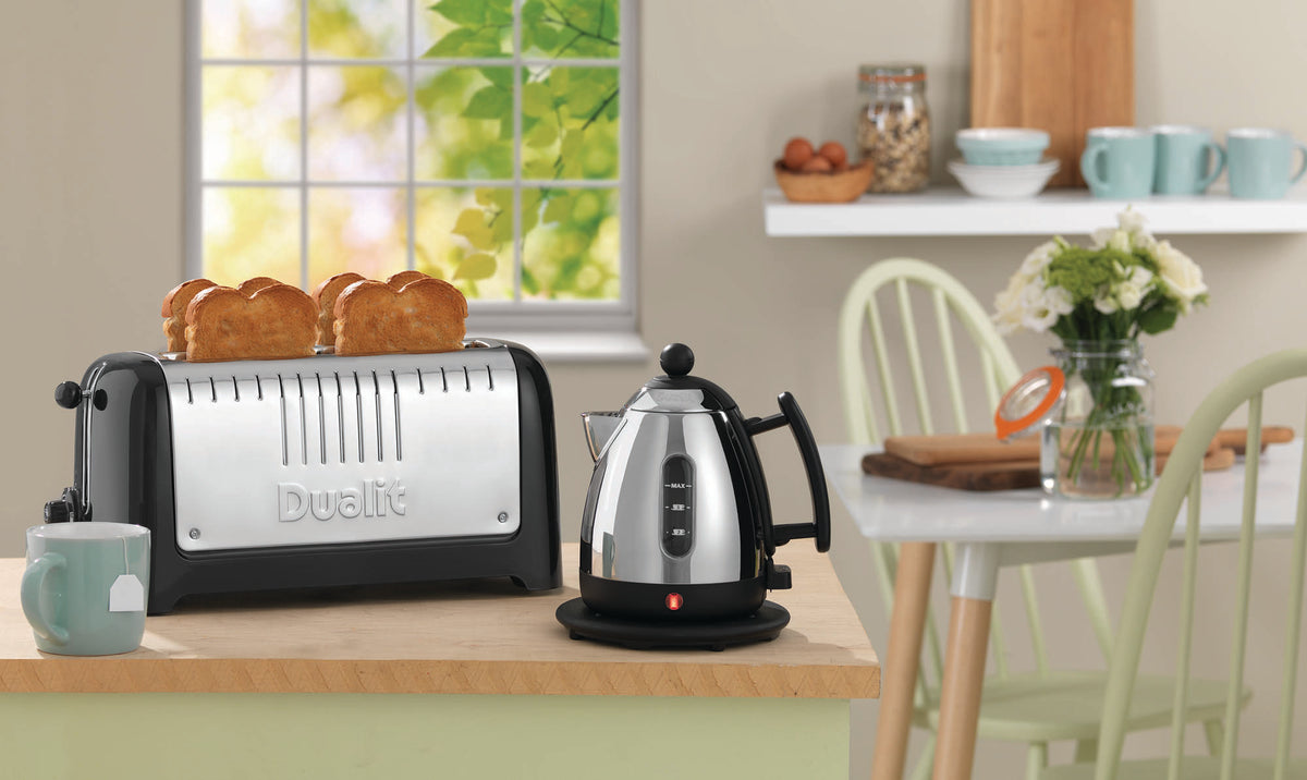 Dualit LITE black 4-slice toaster with sleek design and control buttons, ideal for quick, even toasting of bread slices.