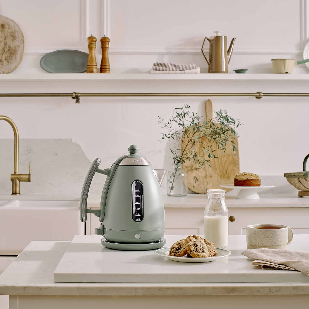 Dualit LITE water kettle in sage green with 1.5L capacity, featuring a sleek design and ergonomic handle.