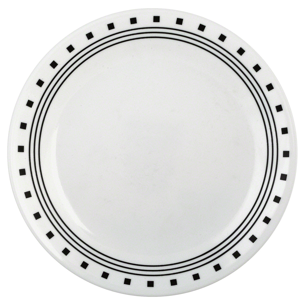 White CORELLE City Block dinnerware set with plates and bowls arranged on a table, showcasing modern ceramic design.
