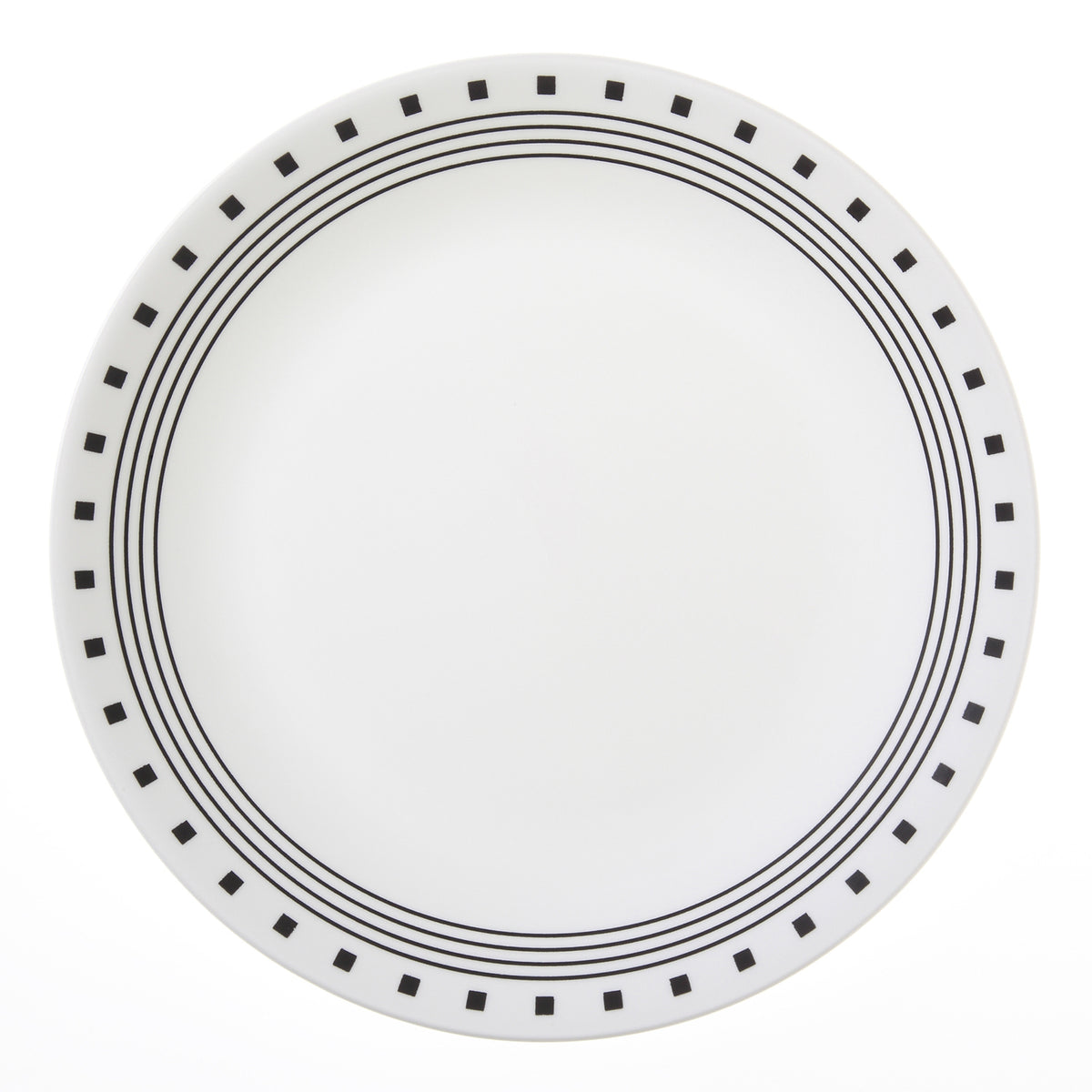 Corelle City Block white dinnerware set featuring plates, bowls, and cups arranged on a table for serving meals.