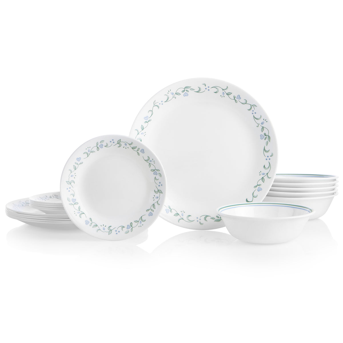 Corelle Country Cottage white dinnerware service with plates, bowls, and mugs arranged on a table.