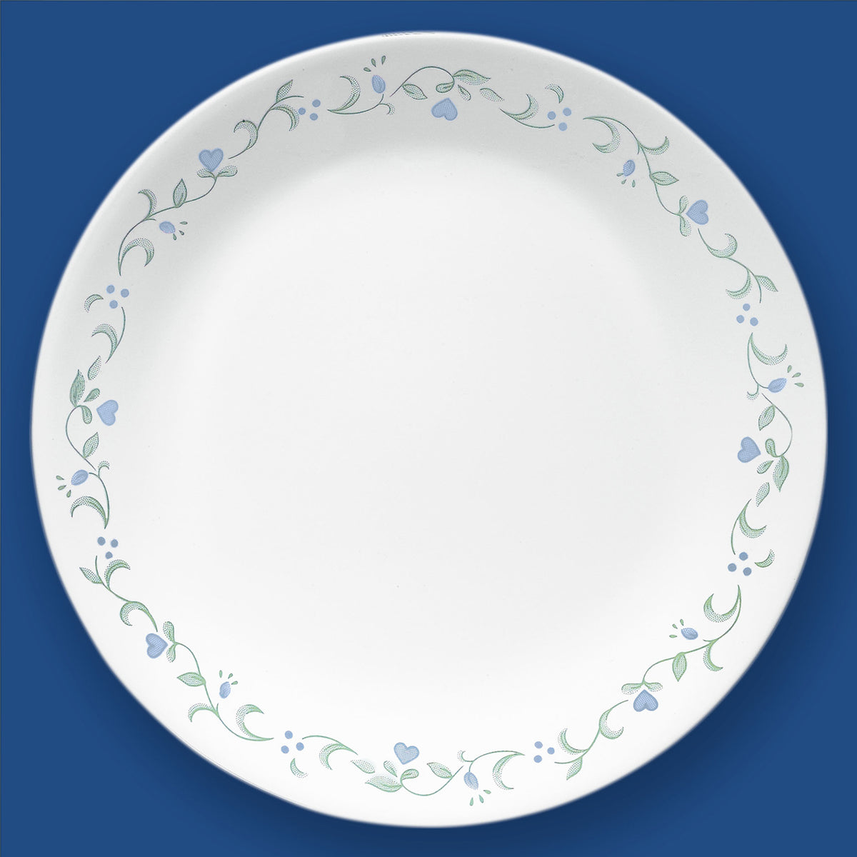 Corelle Country Cottage white ceramic dinnerware set with floral graphic design, includes plates and bowls.