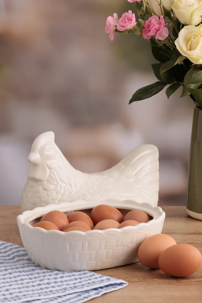 White Mason Cash ceramic chicken figurine, detailed ceramic model of a chicken, decorative kitchen or home accent piece.