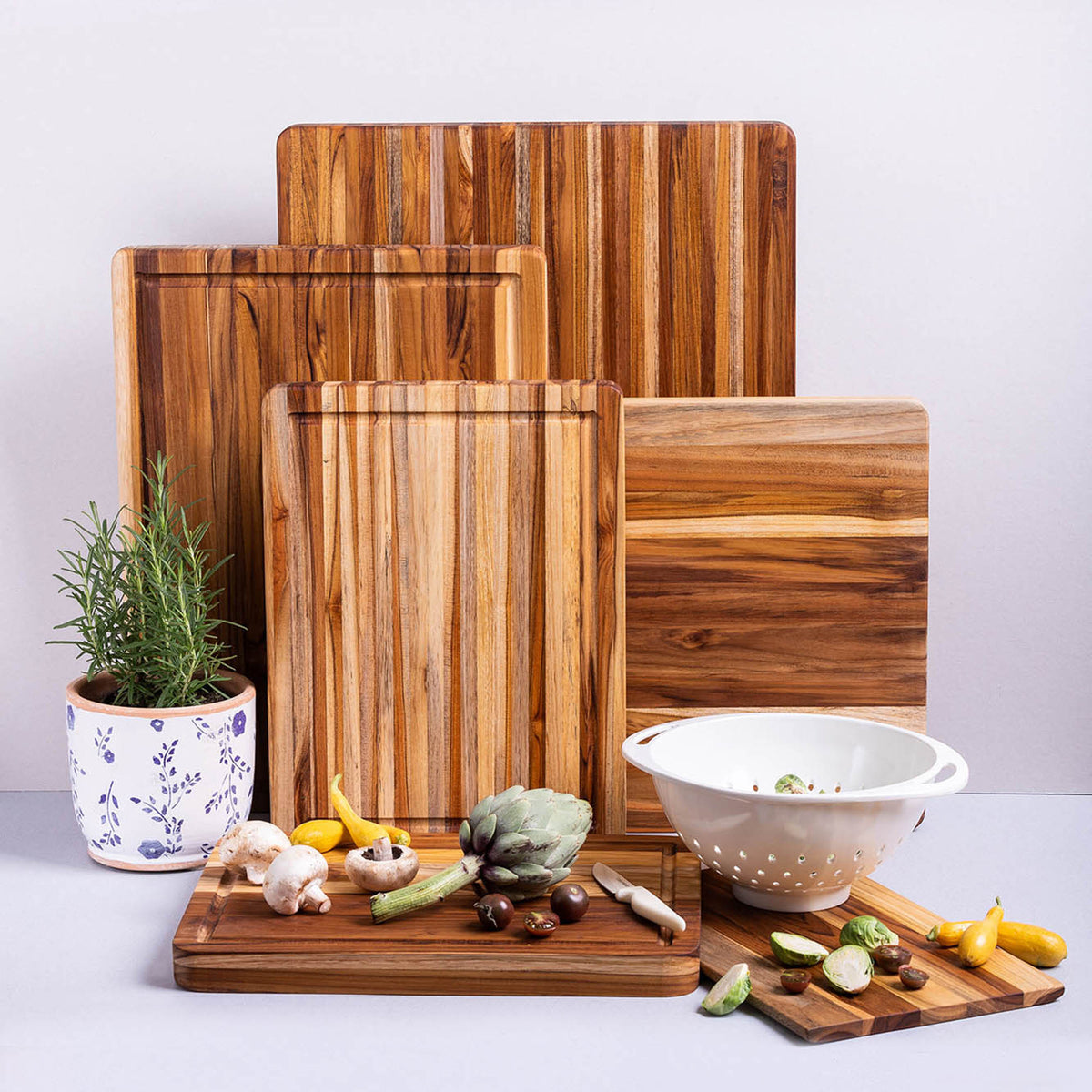TEAKHAUS teak wood cutting board, rectangular traditional style, durable and smooth surface for food preparation.
