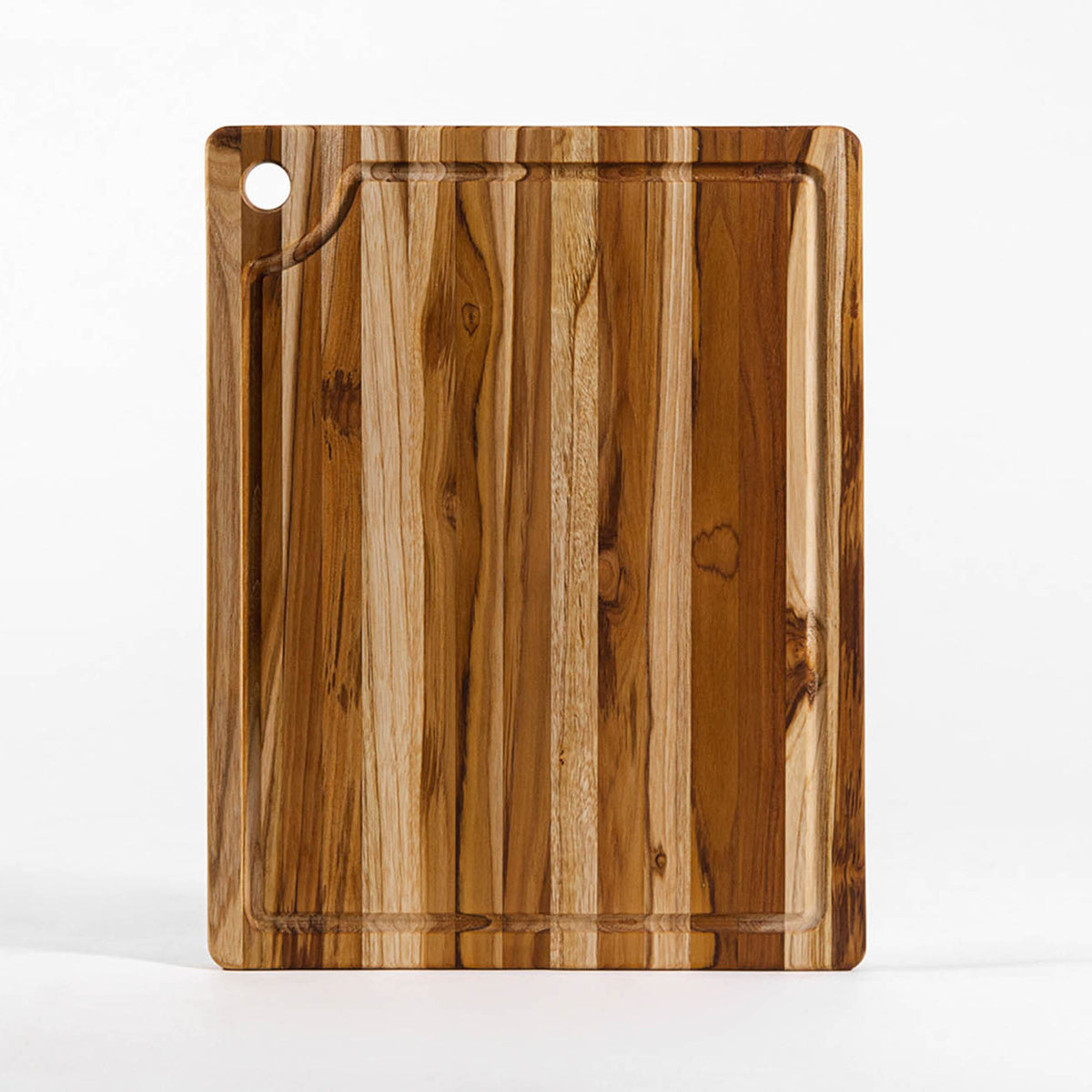 TeakHAUS Marine teakwood cutting board with smooth surface and natural wood grain for kitchen use.