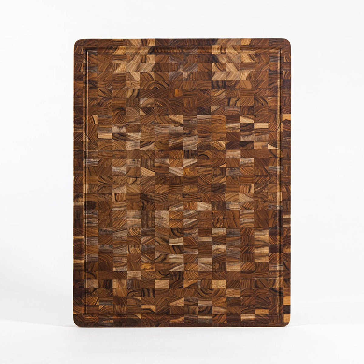 TEAKHAUS teak wood butcher block cutting and chopping board with smooth surface and sturdy construction for kitchen use.