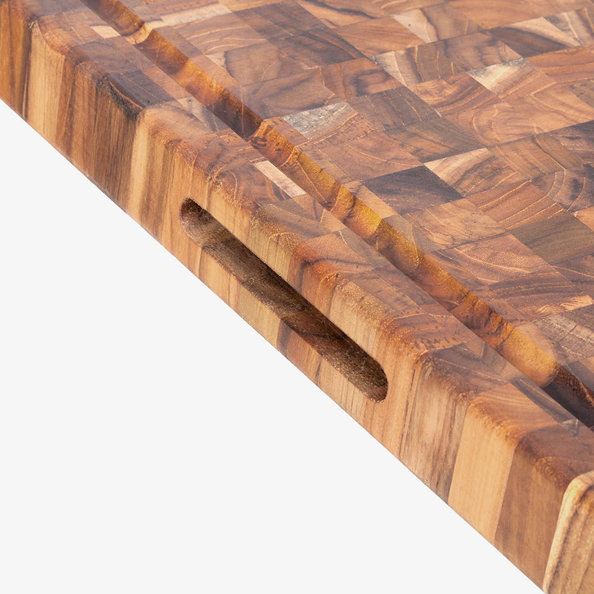 TEAKHAUS teakwood butcher block cutting board with a smooth surface, ideal for chopping and food prep in the kitchen.