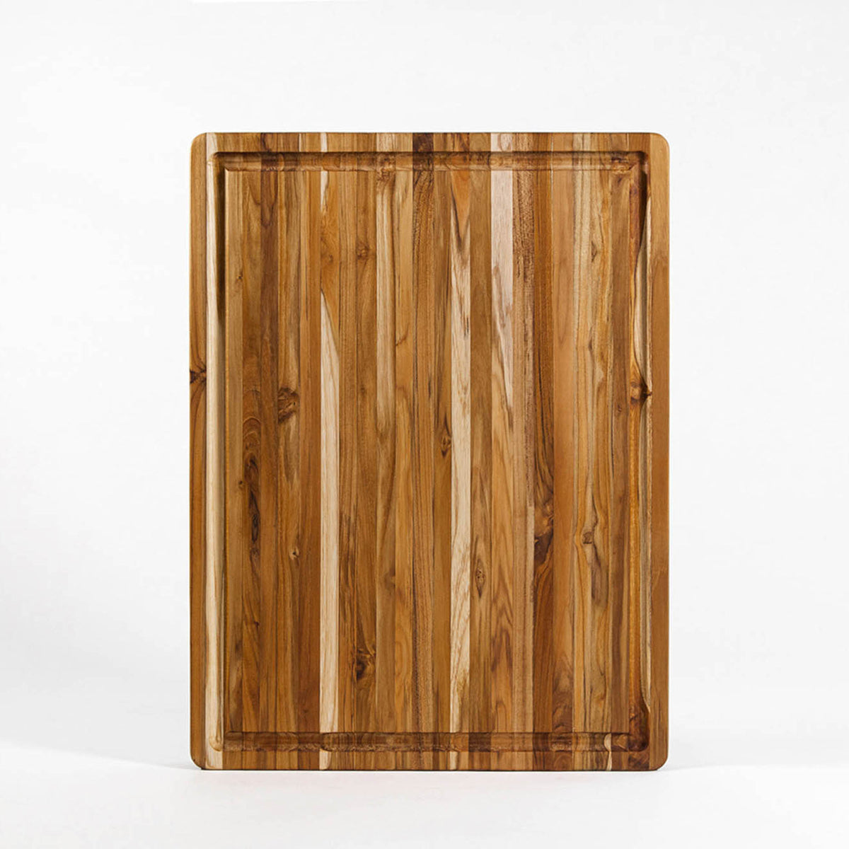 TEAKHAUS teak wood rectangular cutting board with traditional design, natural wood grain and smooth finish.