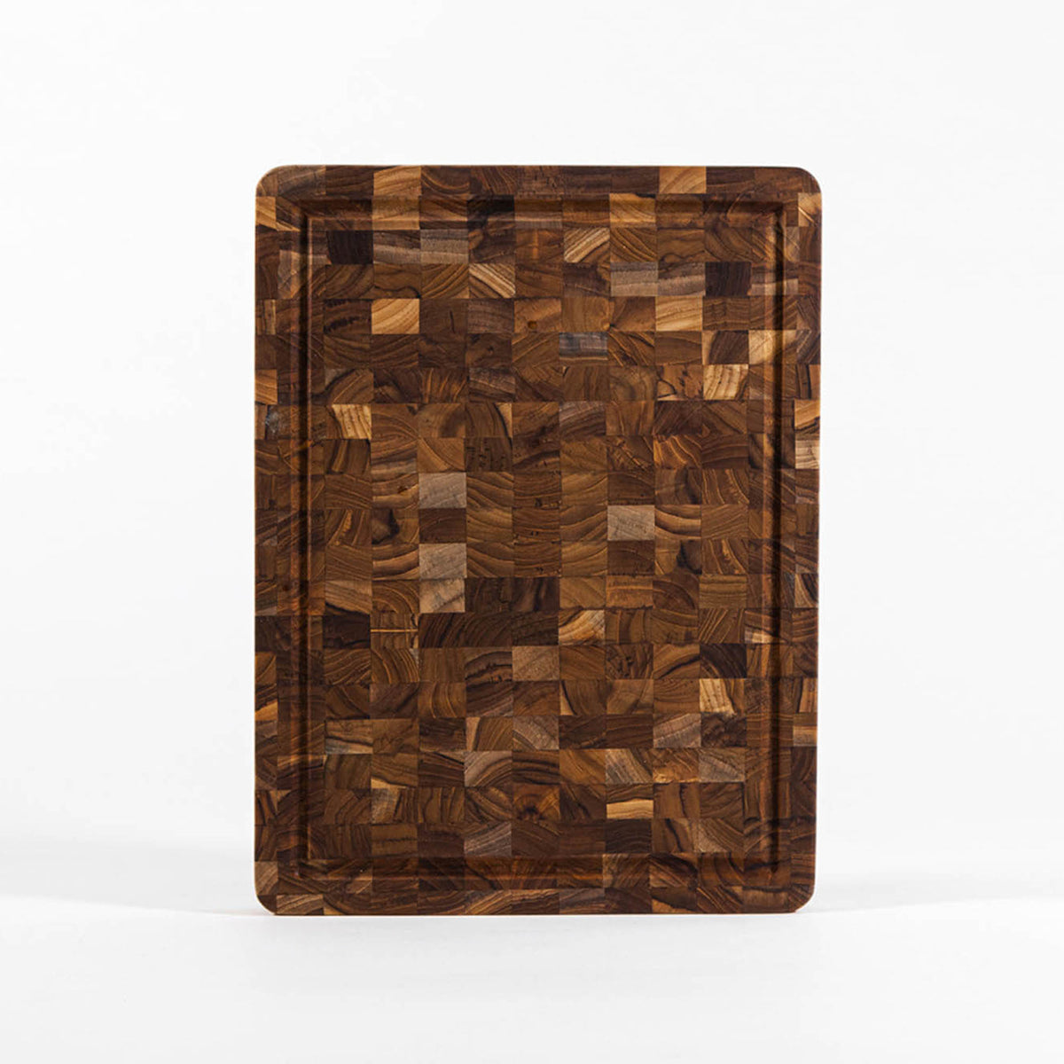 TEAKHAUS teak wood butcher block cutting and chopping board with smooth surface and sturdy construction for kitchen use.