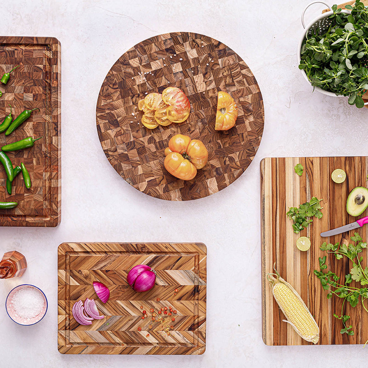 Teakhaus teak wood cutting board with herringbone pattern, ideal for kitchen prep and serving.