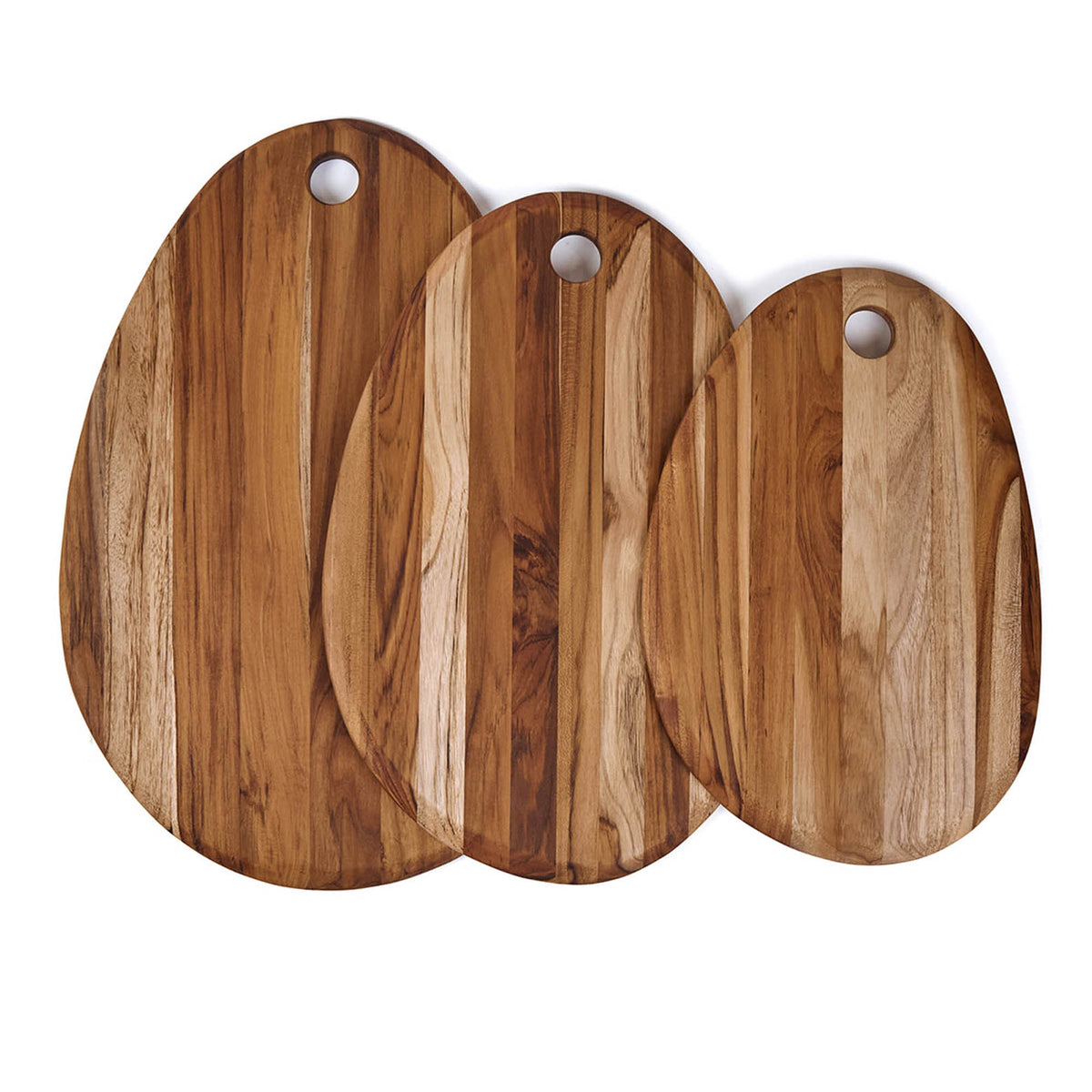 Oval teak cutting board by TEAKHAUS made of durable teak wood, ideal for food preparation and serving.