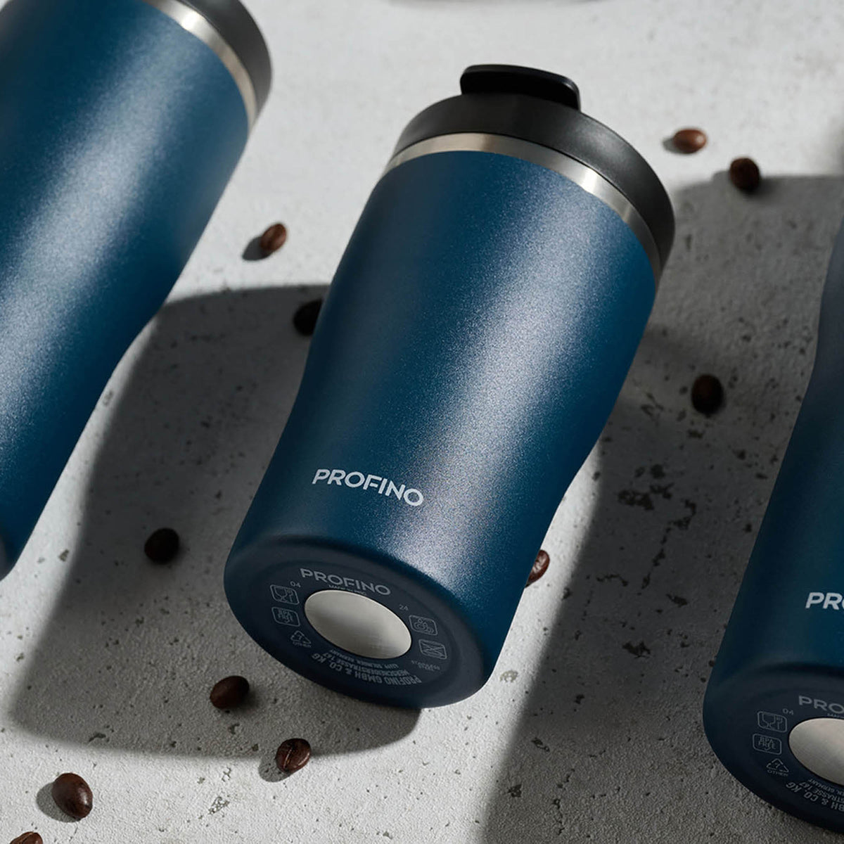 Blue PROFINO BARISTA thermobecher with a sleek design, insulated for hot and cold beverages, perfect for on-the-go use.