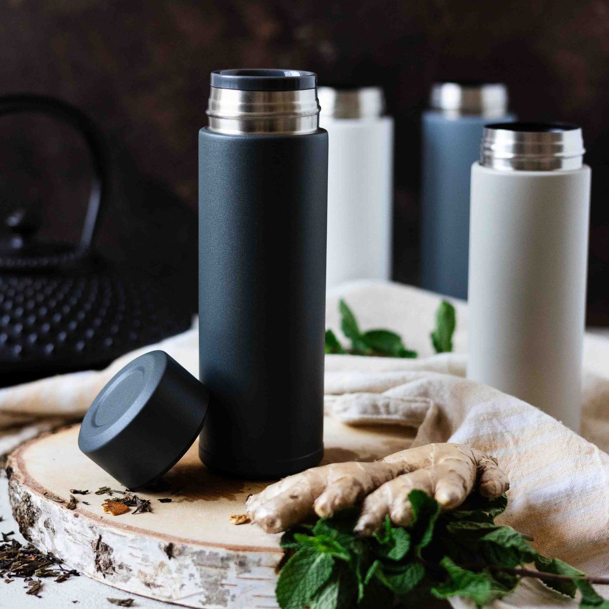 KYOCERA Slim Mug insulated bottle in beige, 300ml, showing the sleek design and beige exterior of the product.