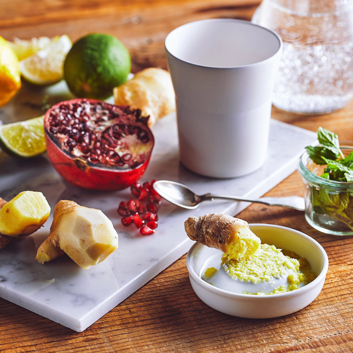 White KYOCERA ceramic grater with a sleek design, perfect for grating cheese, vegetables, or spices.