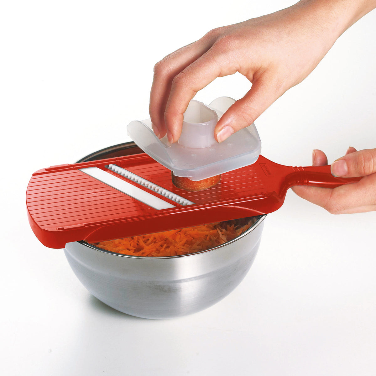 KYOCERA julienne vegetable peeler in black with ergonomic handle and stainless steel blade for precise slicing.