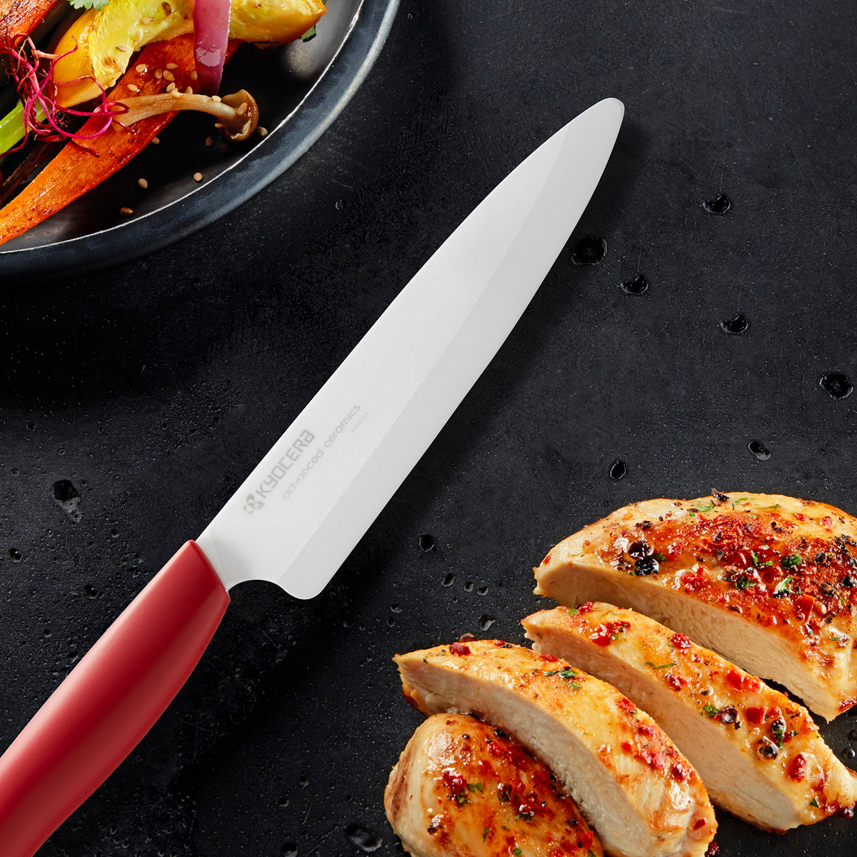 KYOCERA ceramic kitchen knife, GEN RED, red handle and blade, designed for precise cutting and durability in food preparation