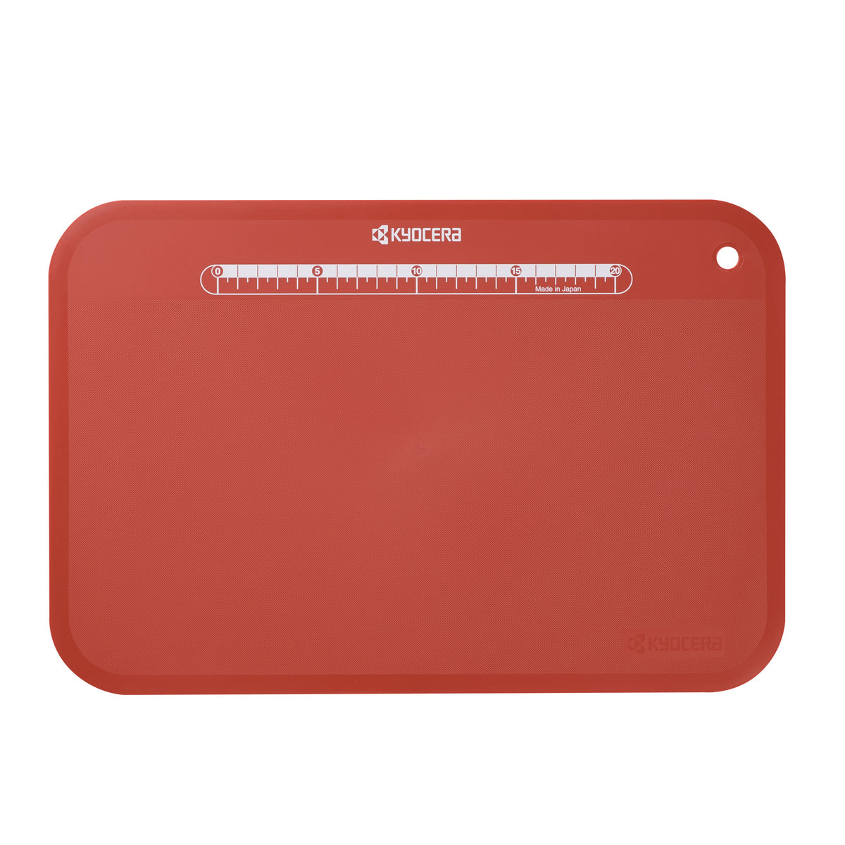 KYOCERA flexible black cutting mat, 37x25 cm, ideal for precise slicing and protecting surfaces during food preparation.