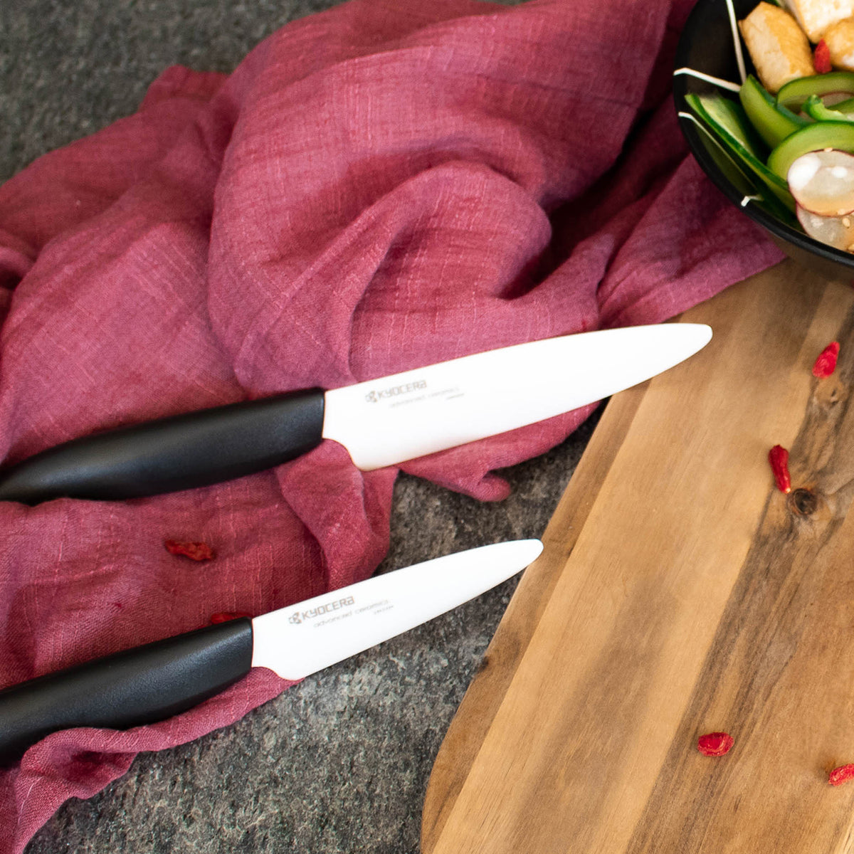 KYOCERA GEN NATURE black ceramic knife with sleek handle and sharp blade for precise cutting.