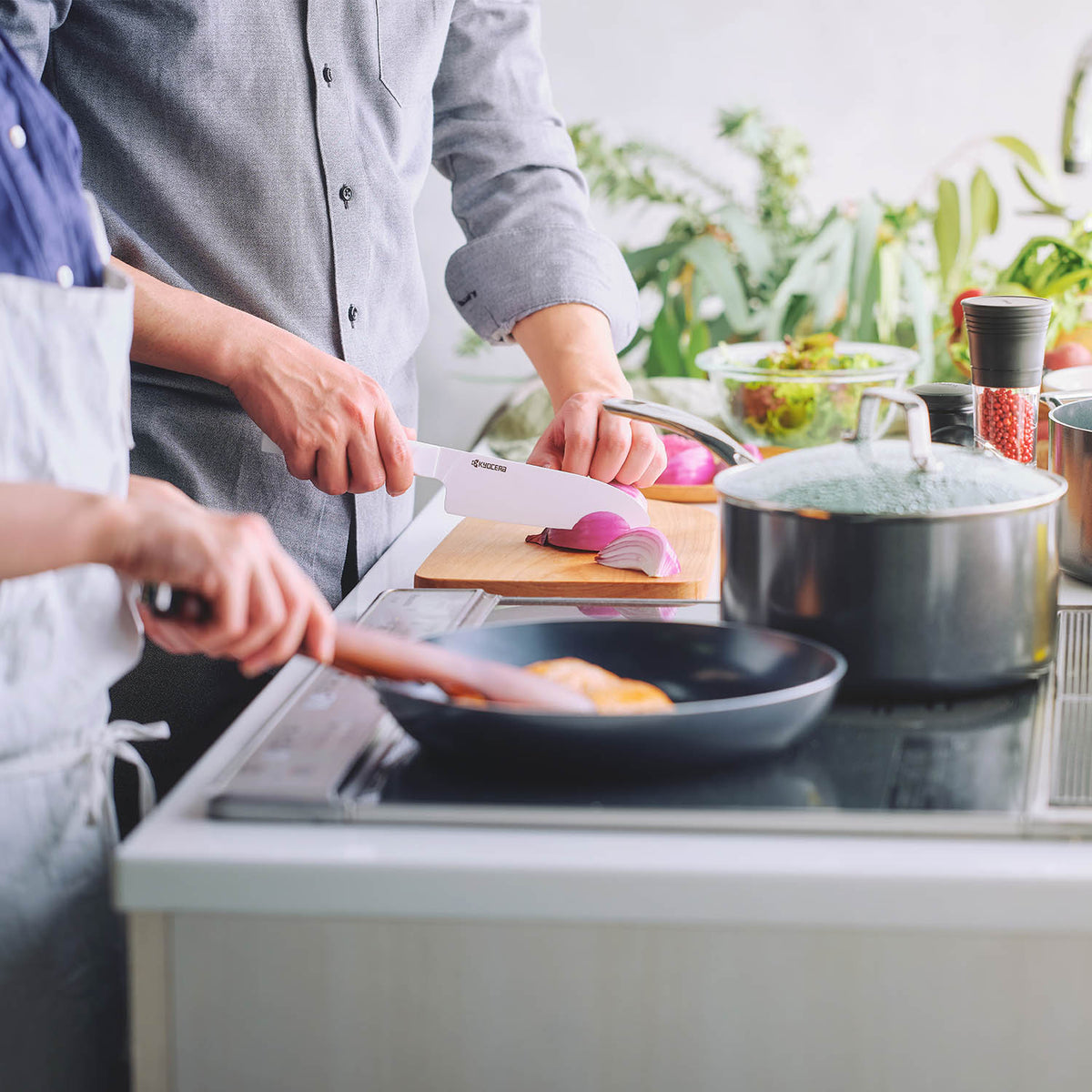 KYOCERA white ceramic knife, Chowa series, with sleek handle and sharp blade, ideal for precise kitchen cutting tasks.