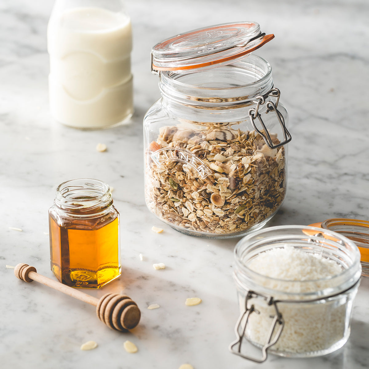 Clear KILNER Clip Square canning jar with metal clip lid and glass body for preserving food and storing pantry items.