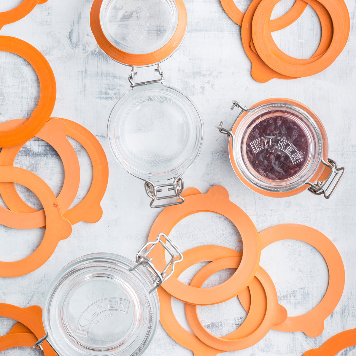 Set of six KILNER Einkochringe in various sizes from 0.35 to 2 liters for jar sealing and preservation.