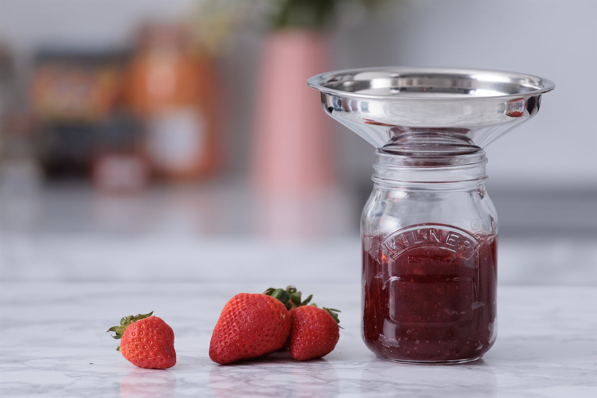 KILNER stainless steel funnel with Easy Fill design, 14.5 cm diameter for pouring liquids and transferring ingredients efficiently.