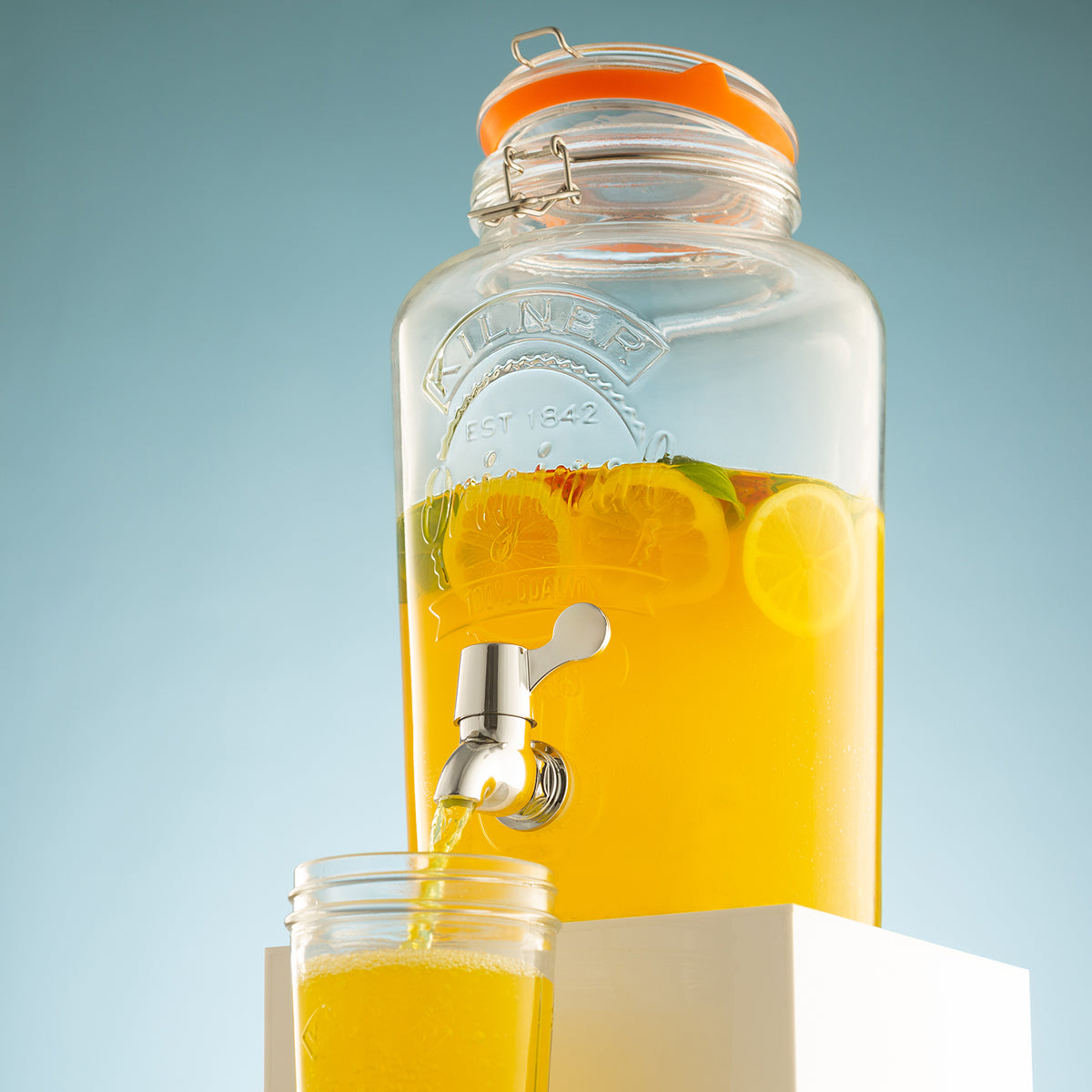 Clear 5L KILNER round beverage dispenser with spigot and glass body for serving drinks at gatherings.
