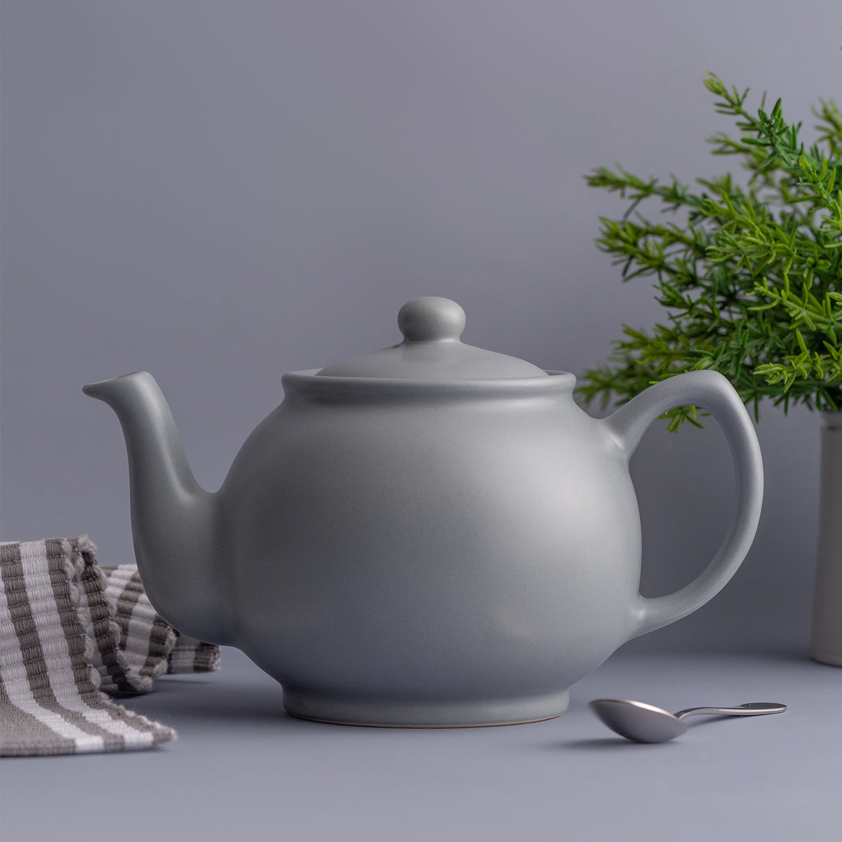 Gray P & K PRICE & KENSINGTON teapot with a classic design, featuring a smooth surface and elegant handle.
