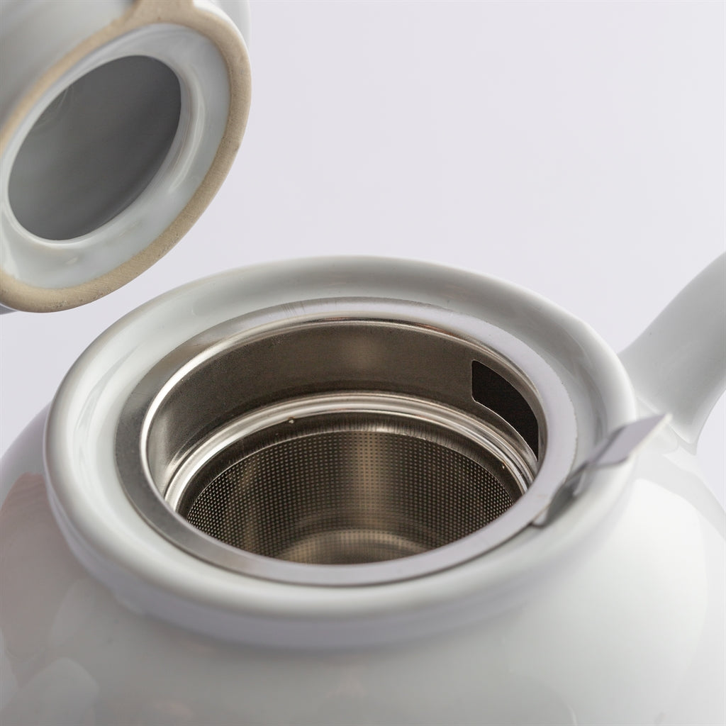 White P & K teapot with infuser, designed for 6 cups, featuring a mesh tea strainer and classic style.