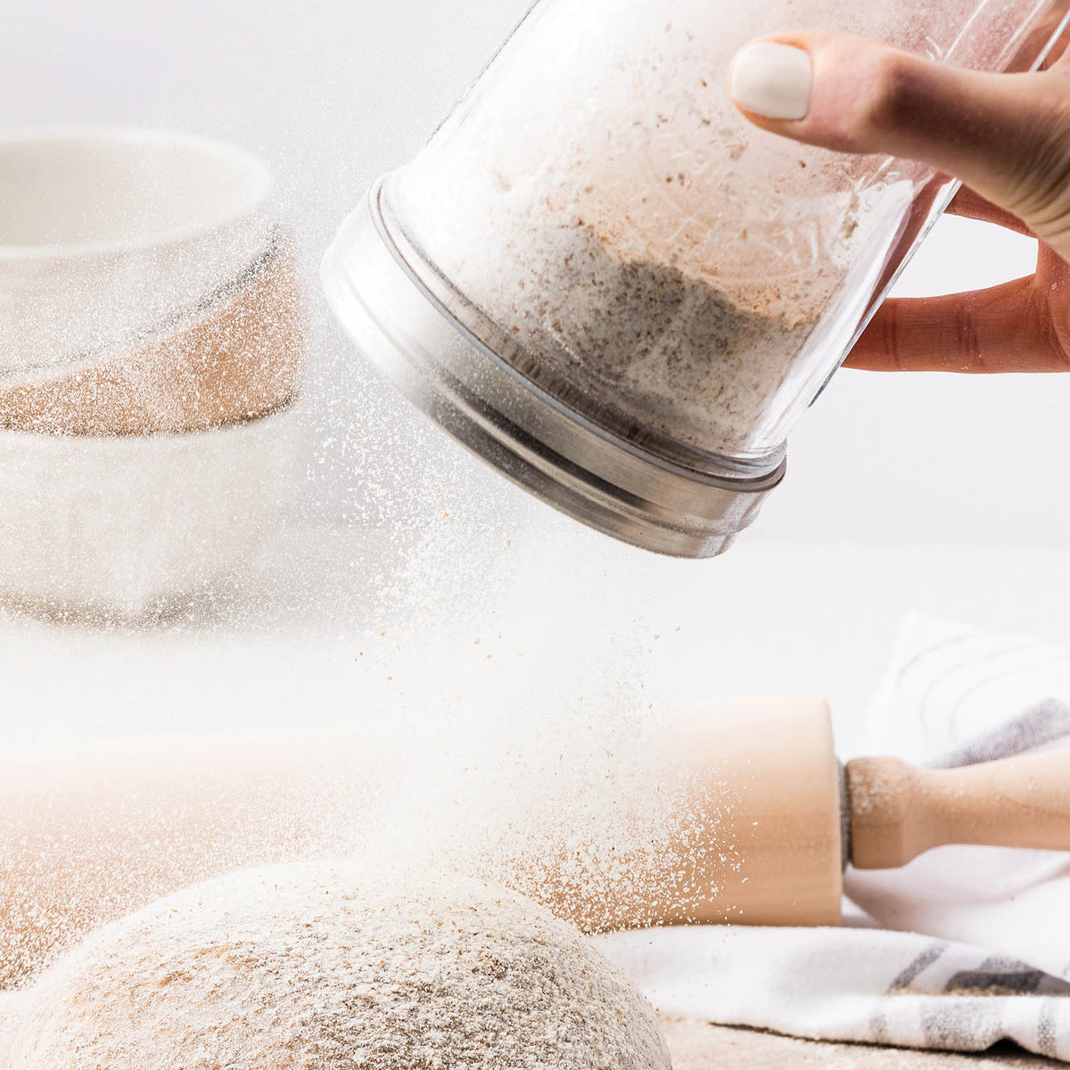 KILNER 0.5L square storage jar with sieve lid for preserving and storing dry goods or liquids.