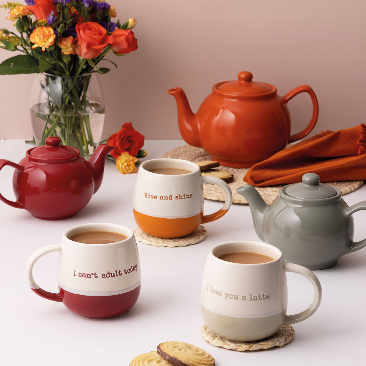 Orange P & K Rise and Shine tasse with bold design, featuring a sturdy handle and a vibrant, eye-catching appearance.