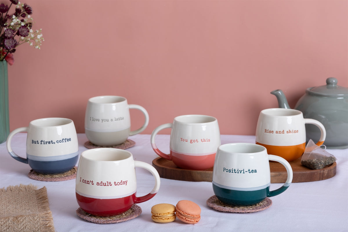 P & K Rise and Shine orange mug featuring a bold design, perfect for morning coffee or tea.