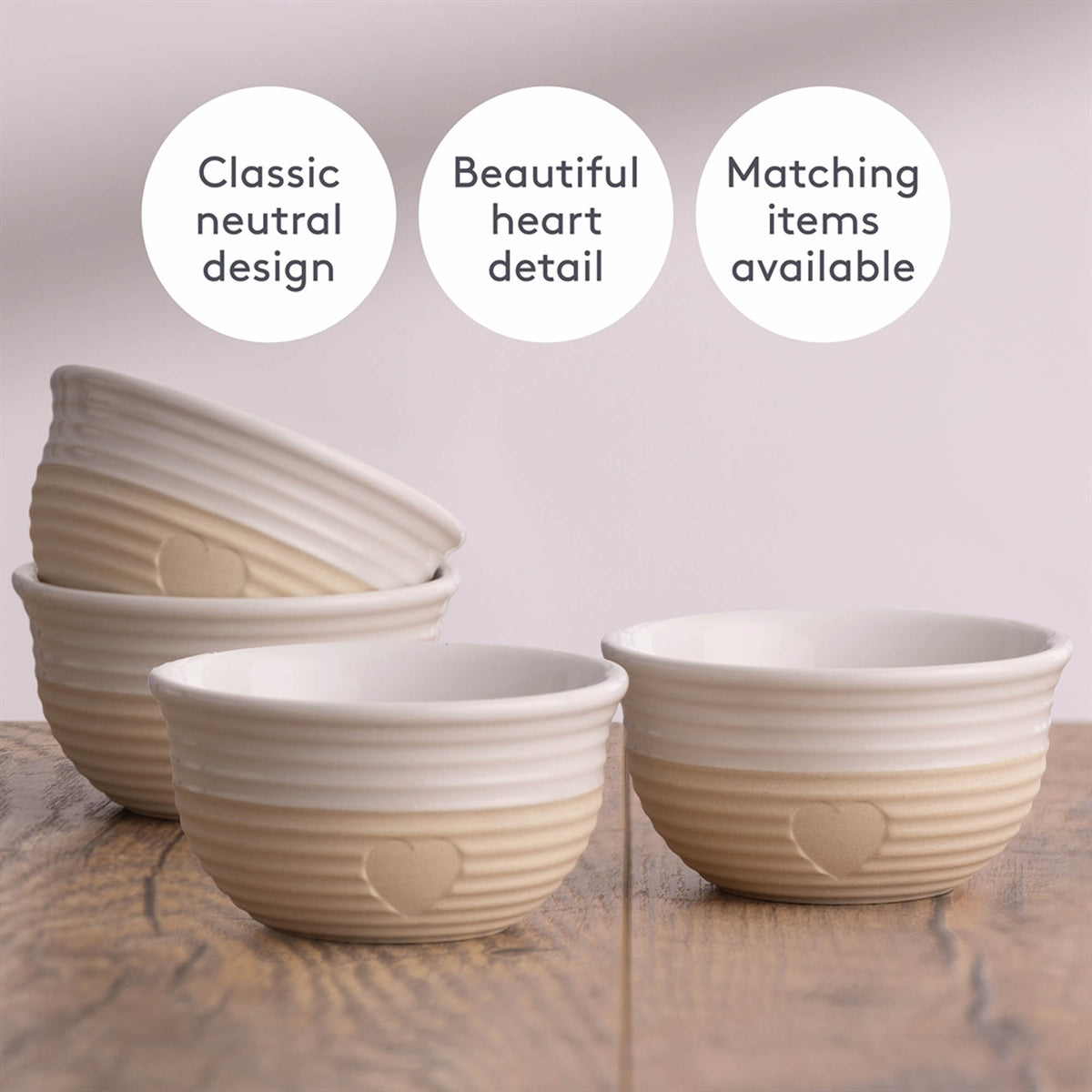 Set of four Mason Cash rustic beige bowls with a charming, textured design for serving and mixing in the kitchen.