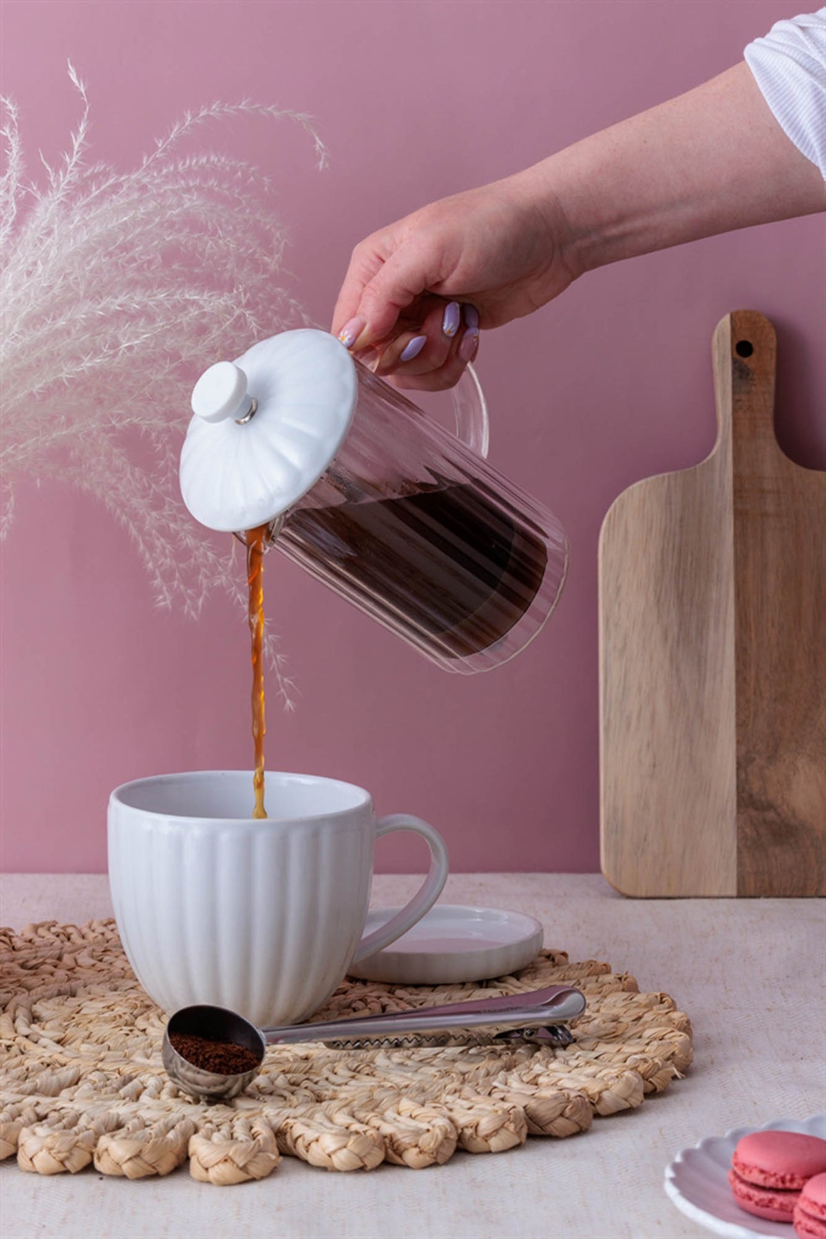P & K French Press Luxe in white with a sleek glass body and stainless steel lid for brewing coffee or tea.