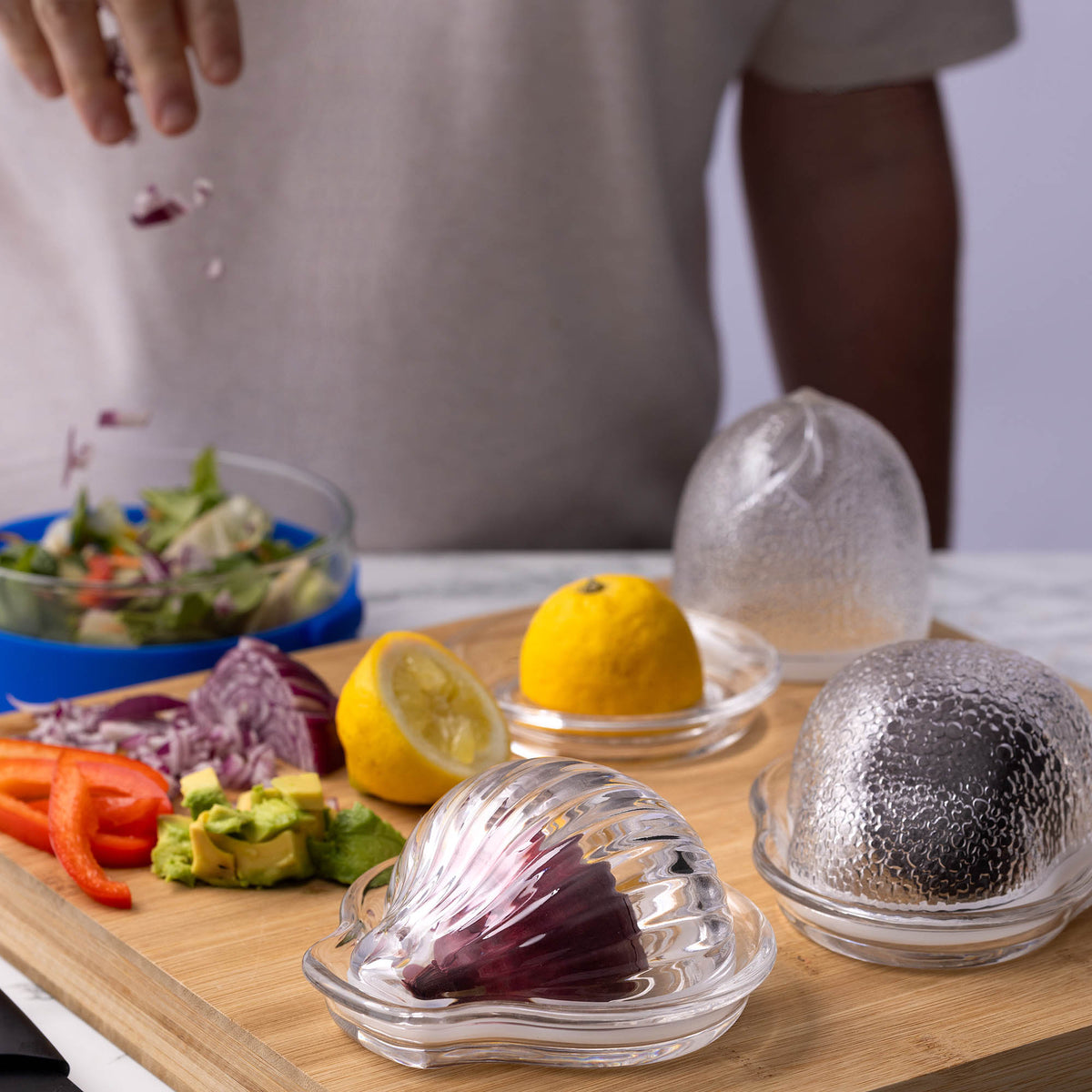 KILNER Avocado Keeper in clear plastic, reusable food storage container for fresh avocados, with secure lid and transparent design.