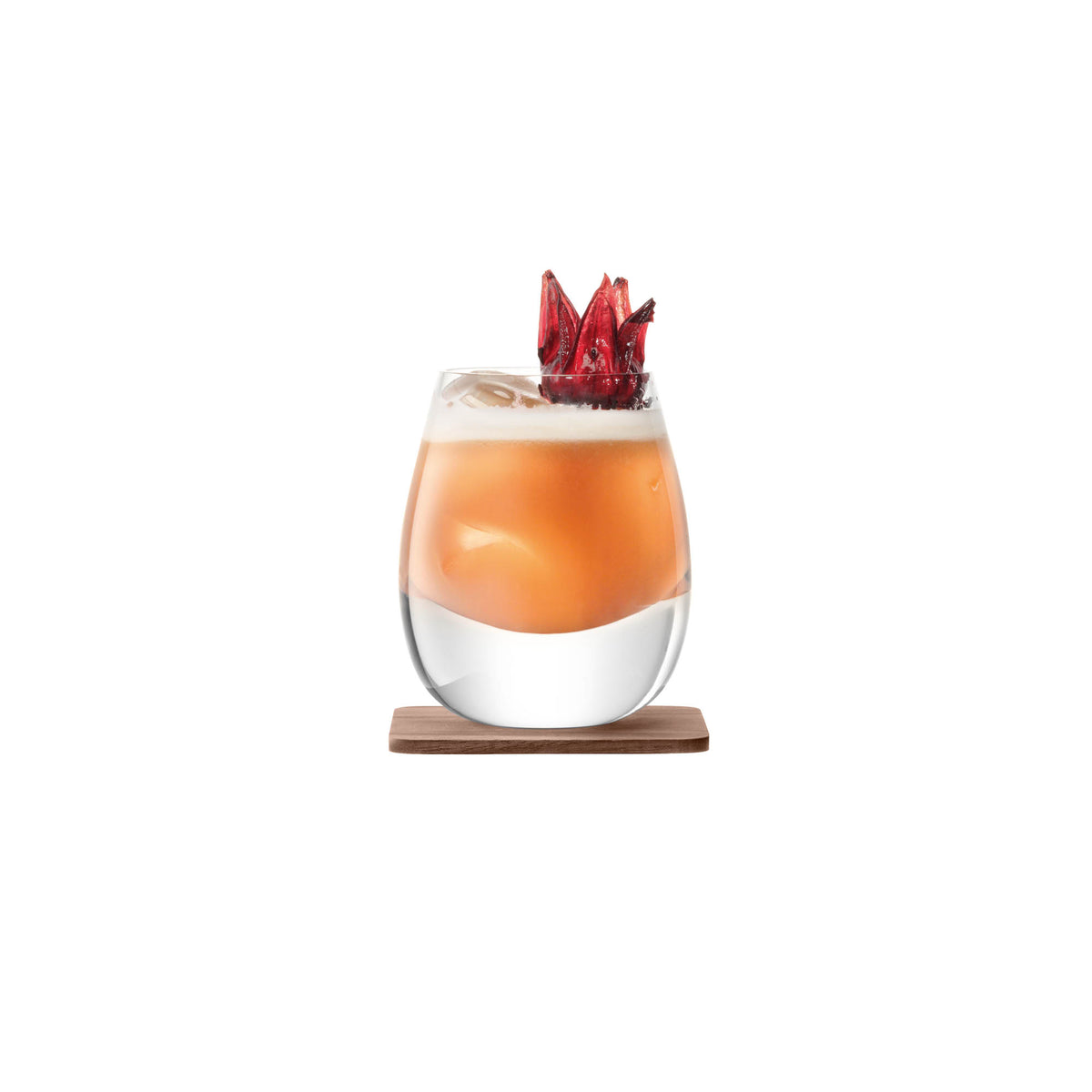 LSA Whisky Islay Tumbler 250ml clear glass with walnut coaster, designed for long drinks, showcasing elegant craftsmanship.