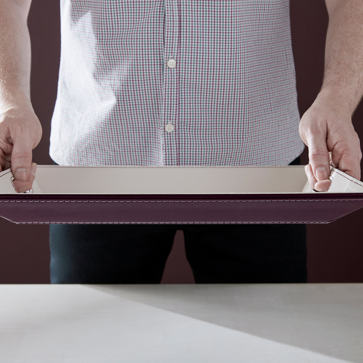 FREEFORM DUO tablet in plum and ivory, showing the elegant, rectangular design with smooth finish and subtle color contrast.