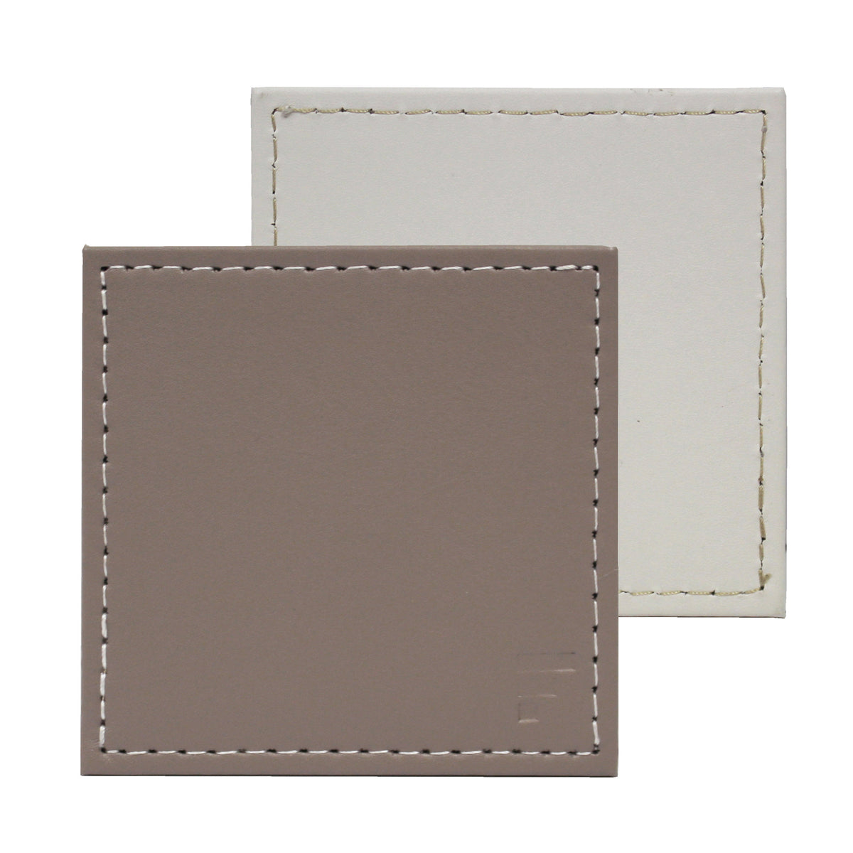 FREEFORM DUO 4-piece coaster set with stylish, round cork coasters for protecting surfaces from heat and moisture.