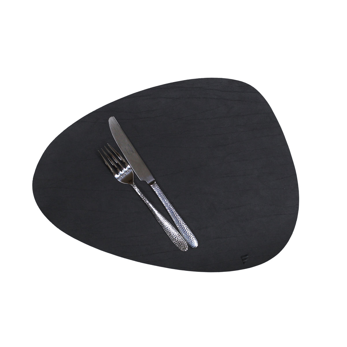 Black FREEFORM Platzset with KIESEL design, 43 x 30 cm, showing a textured surface and stylish tableware protection.