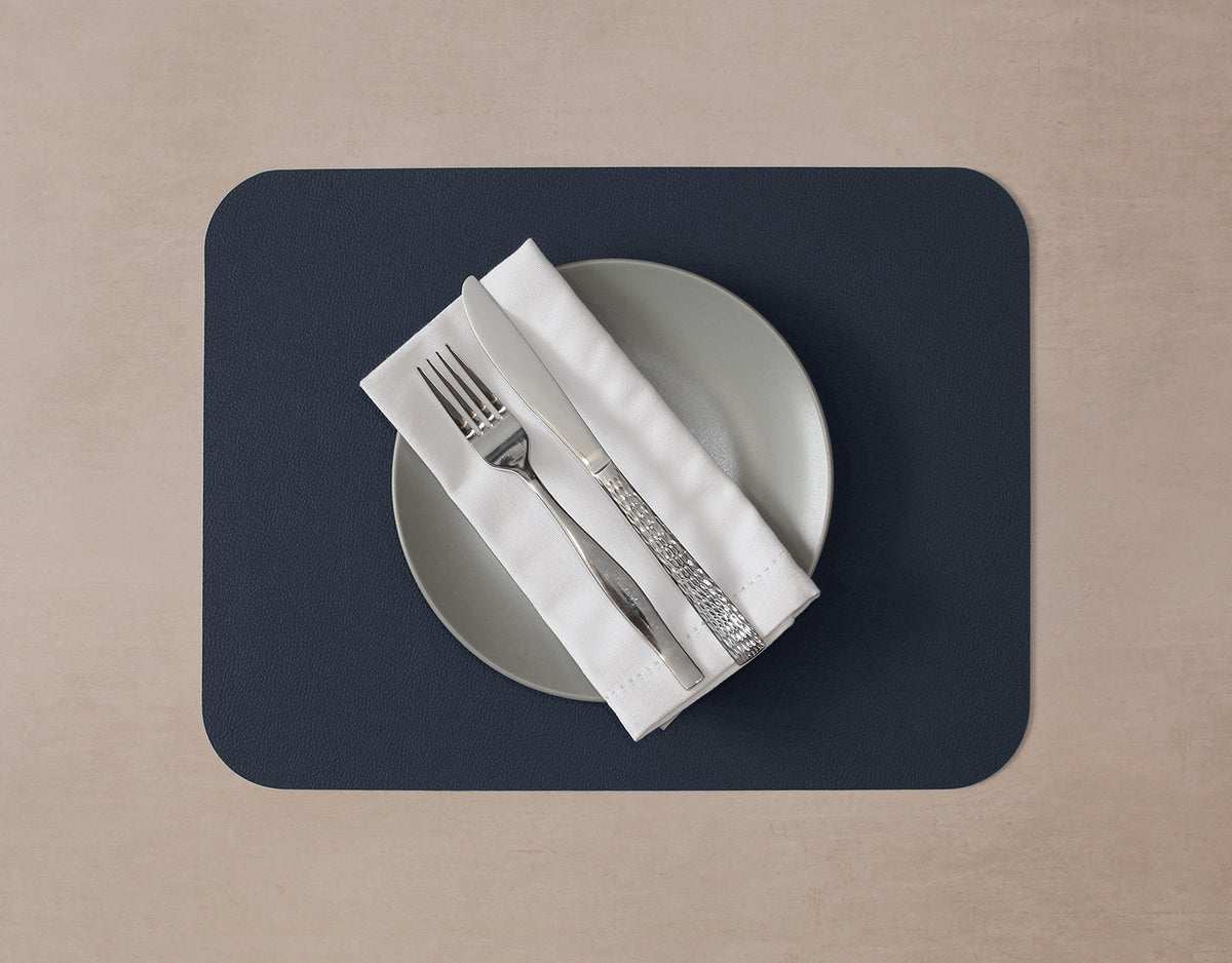 FREEFORM FLEXI 2-piece table setting set with colorful placemats and napkins, stylish and functional for dining.