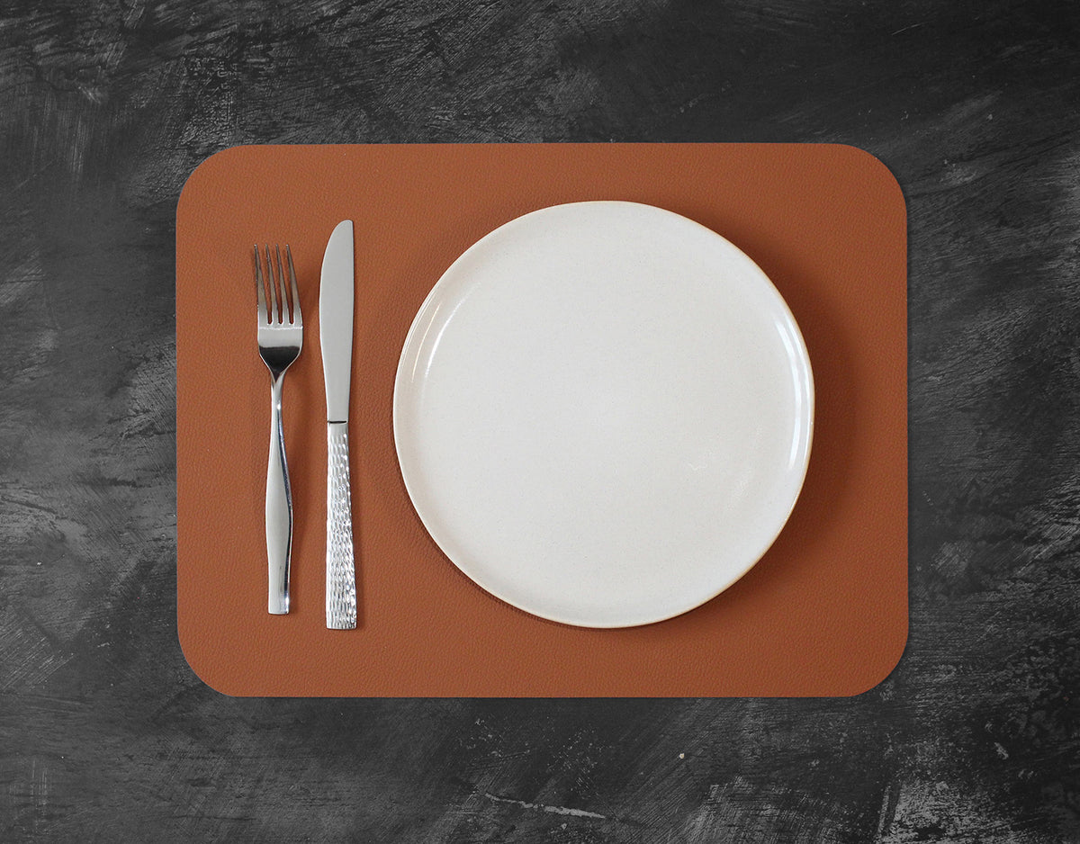 FREEFORM FLEXI 2-piece table mat set featuring colorful, flexible design with textured surface for dining and table protection.