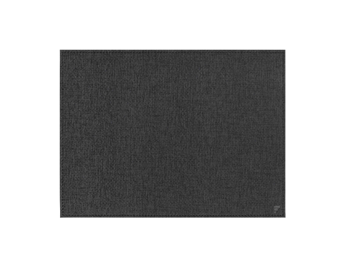 Oval black textile table mat by FREEFORM, measuring 40 x 30 cm, designed for elegant dining protection.